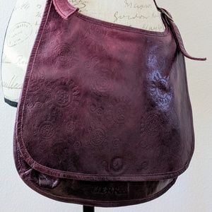 Purple pressed leather crossbody purse from Spain